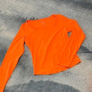 114. Vibrant Orange Long Sleeve Women's Top